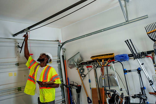 Professional Garage Door Panel Replacement technician working in Audubon Park, NJ